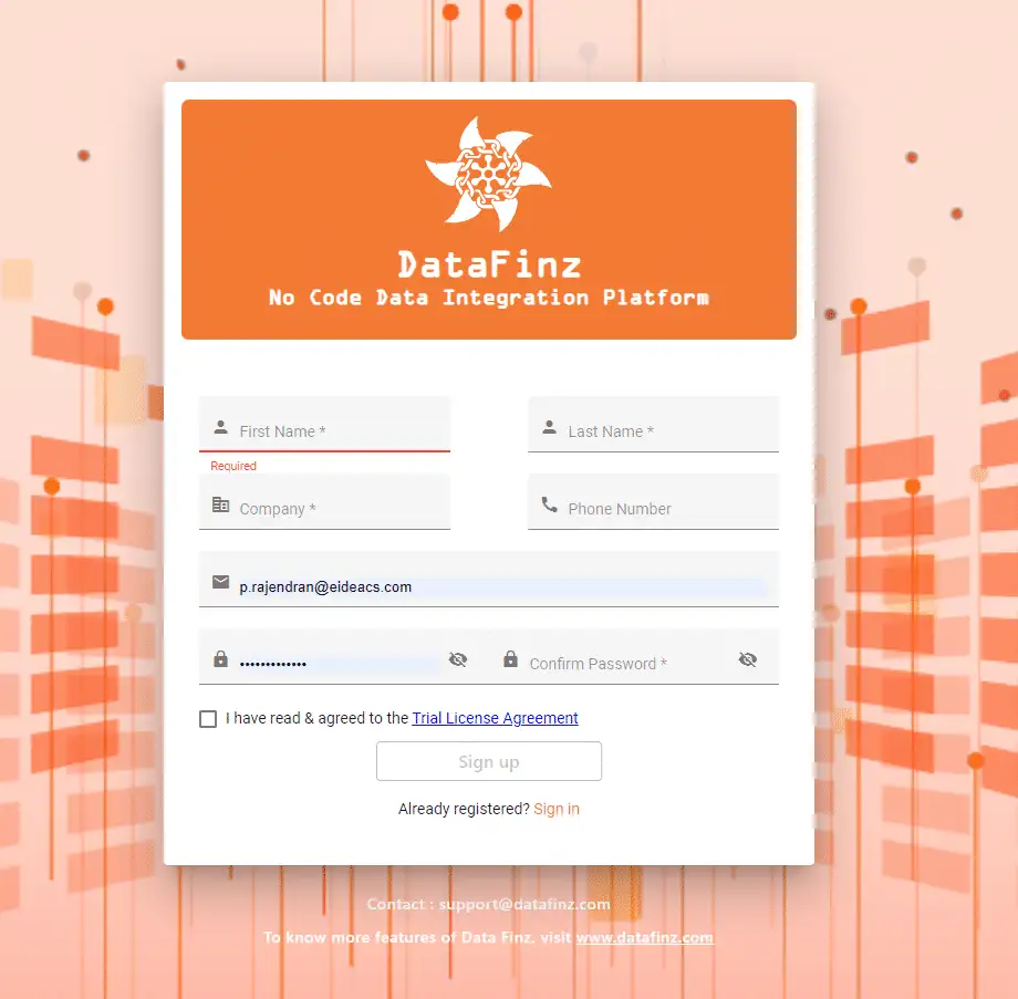 Sign Up for a Free Trial: User entering their information on a registration form on a digital platform.